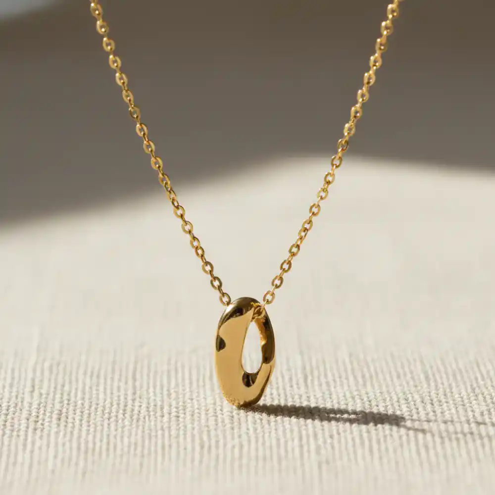Gold necklace detail